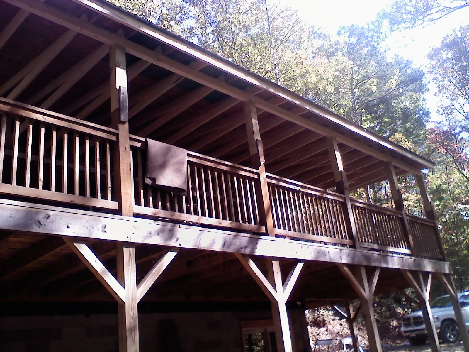 Timber framing under a new elevated porch and deck — Roof Leak Repair in Port Orange by Roofing Brothers